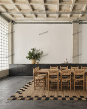 Load image into Gallery viewer, Natural Jute Handwoven Rug with Black Checkerboard Border, Modern Rustic Design for Living Room & Bedroom