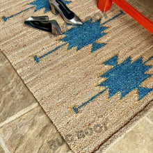 Load image into Gallery viewer, Handwoven Jute Rug with Teal Tribal Motif – Natural Flatweave Runner