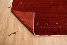 Load image into Gallery viewer, Handcrafted Simplicity | Oversized Gabbeh Rug in Burnt Sienna with Minimalist Design