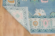 Load image into Gallery viewer, Frost & Flame | Hand-Knotted Turkish Rug in Blue & Ivory with Orange Accents