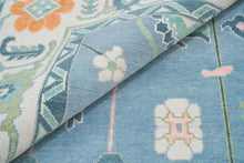 Load image into Gallery viewer, Frost & Flame | Hand-Knotted Turkish Rug in Blue & Ivory with Orange Accents