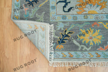 Load image into Gallery viewer, City Skyline Silhouette | Handwoven Oushak Rug | Light Blue with Pops of Color