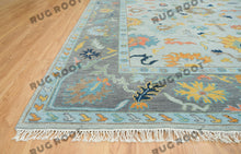 Load image into Gallery viewer, City Skyline Silhouette | Handwoven Oushak Rug | Light Blue with Pops of Color