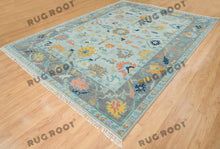 Load image into Gallery viewer, City Skyline Silhouette | Handwoven Oushak Rug | Light Blue with Pops of Color