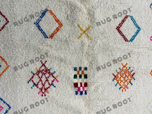 Load image into Gallery viewer, Handcrafted Moroccan Azilal Rug | Whimsical Wool Tapestry in Ivory with Rainbow Accents
