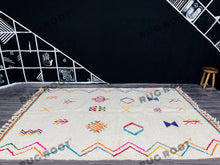 Load image into Gallery viewer, Handcrafted Moroccan Azilal Rug | Whimsical Wool Tapestry in Ivory with Rainbow Accents
