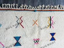 Load image into Gallery viewer, Handcrafted Moroccan Azilal Rug | Whimsical Wool Tapestry in Ivory with Rainbow Accents
