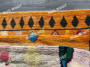 Boho Chic Retreat | Orange Shag Moroccan Rug with Vintage Berber Patterns