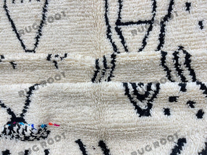 Handcrafted Moroccan Art | Abstract Berber Rug with Bold Black Lines on Ivory Wool