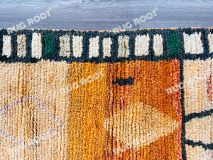 Boho Chic Retreat | Orange Shag Moroccan Rug with Vintage Berber Patterns
