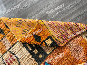 Boho Chic Retreat | Orange Shag Moroccan Rug with Vintage Berber Patterns