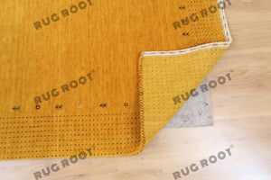 Elegant Hand-Knotted Gabbeh Rug - Warm Amber Hue with Intricate Borders