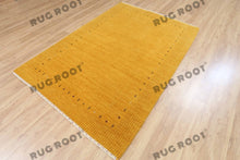 Load image into Gallery viewer, Elegant Hand-Knotted Gabbeh Rug - Warm Amber Hue with Intricate Borders
