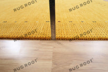 Load image into Gallery viewer, Elegant Hand-Knotted Gabbeh Rug - Warm Amber Hue with Intricate Borders
