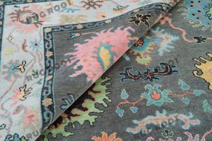 Midnight Garden | Handwoven Dark Grey & Blue Oushak Rug with Pink & Green Accents | Wool, Bedroom