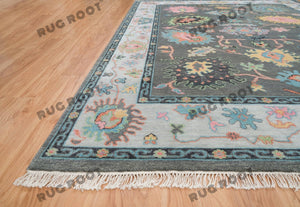 Midnight Garden | Handwoven Dark Grey & Blue Oushak Rug with Pink & Green Accents | Wool, Bedroom
