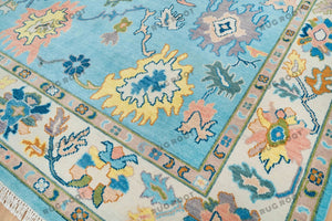 Sky Symphony | Handmade Oushak rug with Intense Orange accents and a Relaxing Blue color